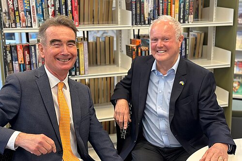 Clive and Stephen sitting in the library